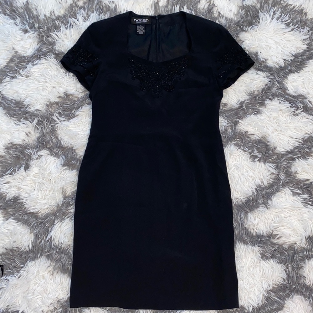 Black padded shoulders fitted dress sparkle detail